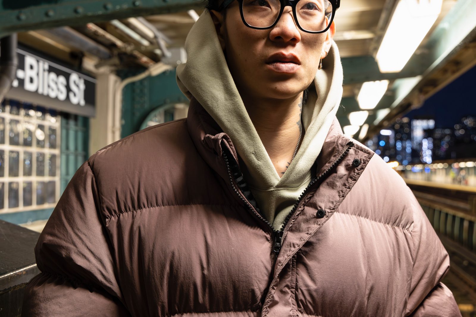 Close portrait of a man in a hooded jacket and glasses — Win or Lose