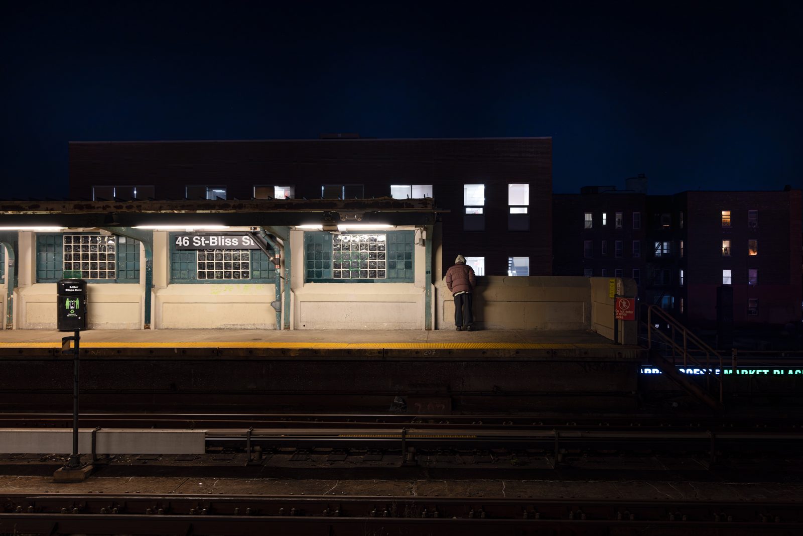 An elevated subway station at night — Win or Lose