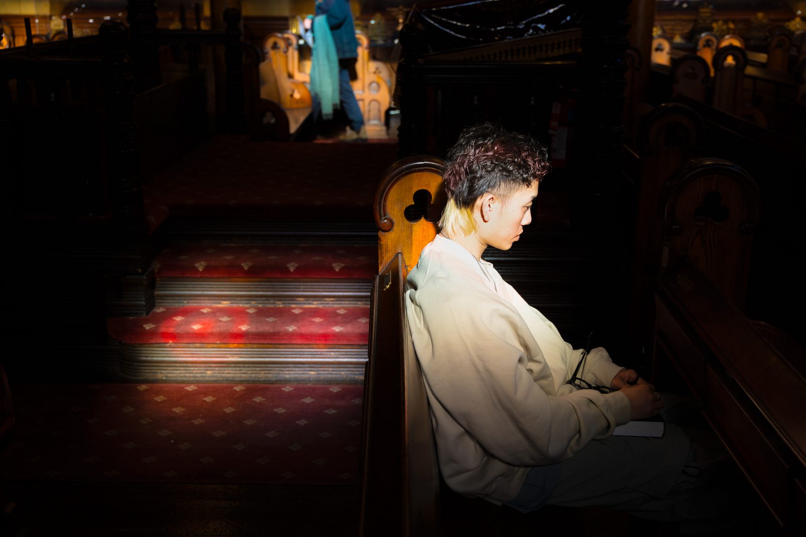 A man playing piano in a dark interior — Win or Lose